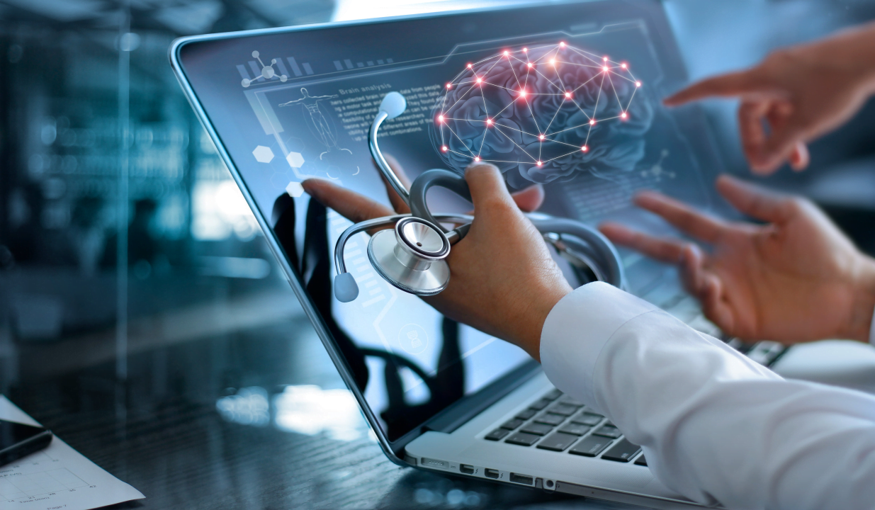 Doctor using AI technology on a laptop